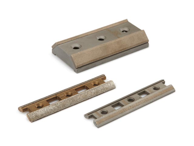 Patins de guides avec revêtement ou insert diamant